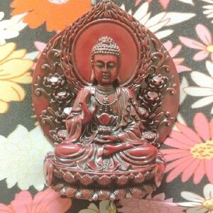 Red Buddha Figurine